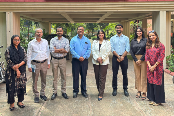 Group of students and company logos at a placement event